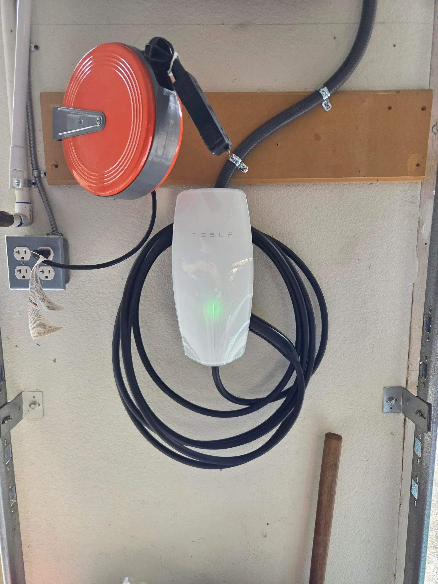 Tesla wall connector installation with conduit in a residential garage